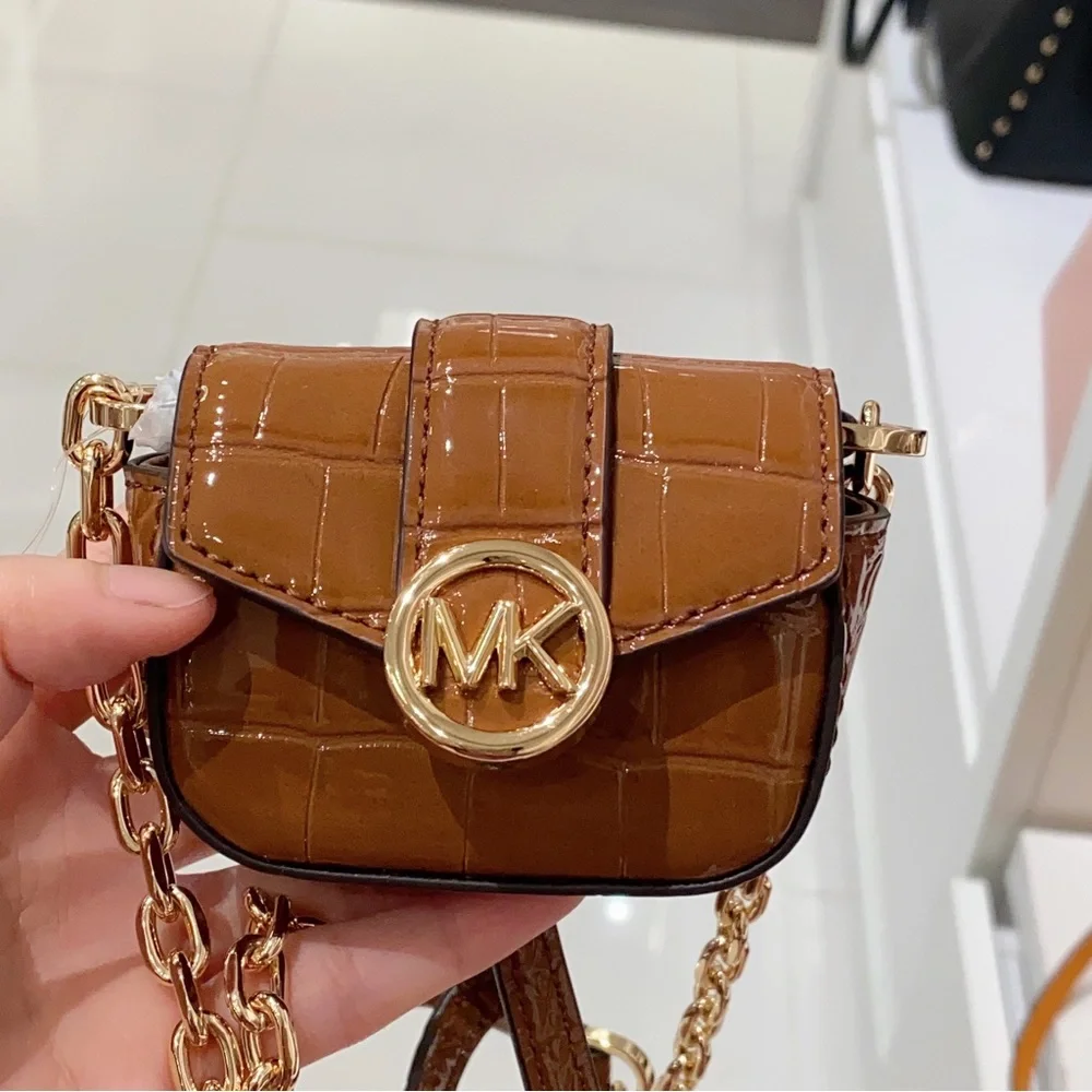 Michael Kors Carmen airpod case with strap